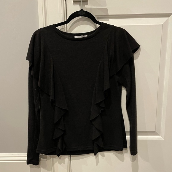 Elevate the every day with this black lightweight, ruffle sweater. - Picture 1 of 11
